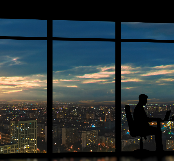 Man looking over a city skyline